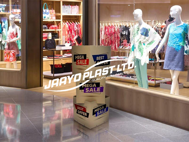 Stacked promotional dump bin printed with sale graphics outside a store