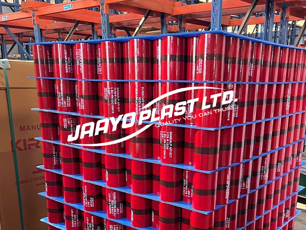 Palletised tubes separated by blue PP layer pads