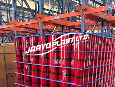 Palletised tubes separated by blue PP layer pads